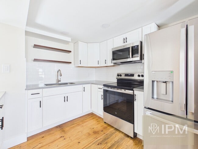 Photo - 305 W Broadway Unit 305.5 W Broadway - Rear