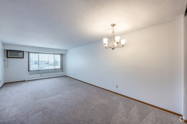 2BR, 1BA - 847SF - B - Dining and Living Room