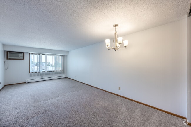 2BR, 1BA - 847SF - B - Dining and Living Room - Surrey Gardens Apartments