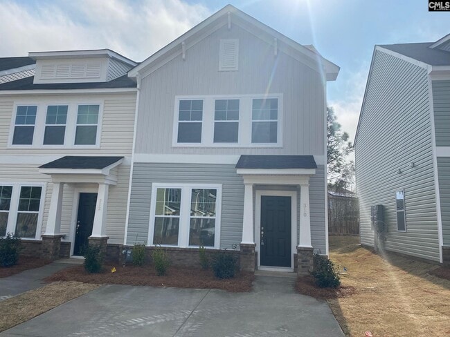 Building Photo - 310 Woodcock Dr