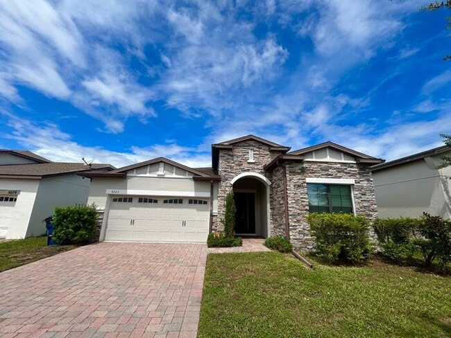 Building Photo - Stylish 4/3 Home with Covered Patio & Gara...