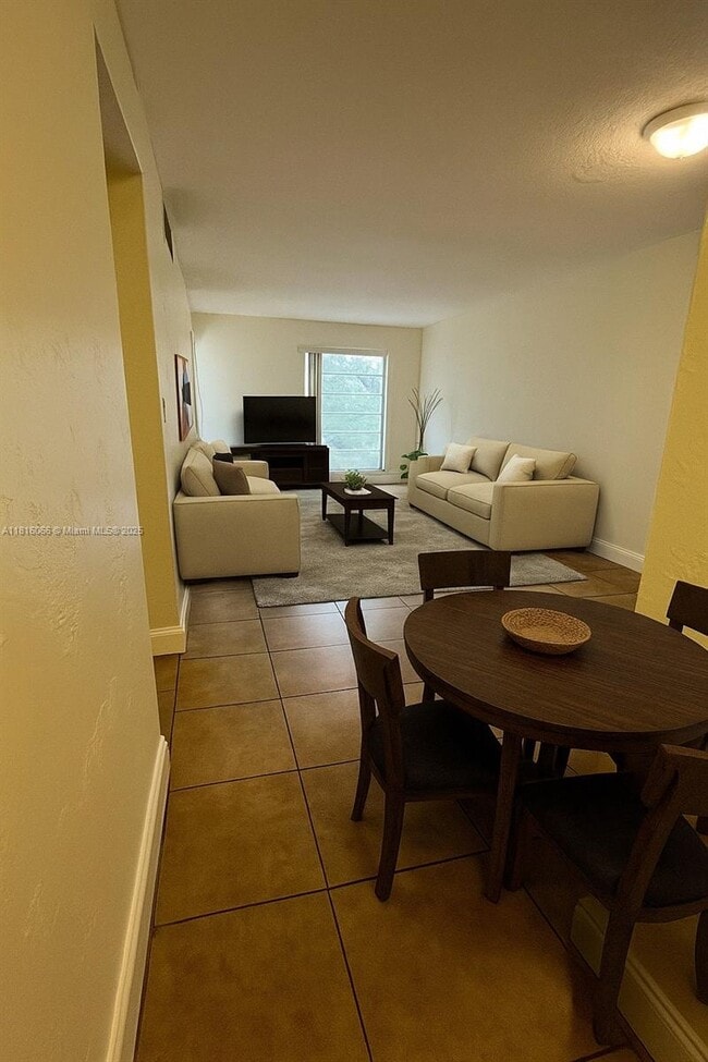Building Photo - 1650 S Le Jeune Rd Unit 204 Rental