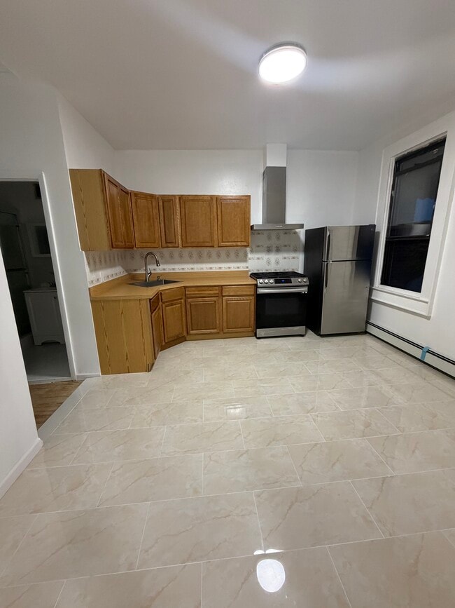 Building Photo - 5512 Roosevelt Ave Unit 2 Floor