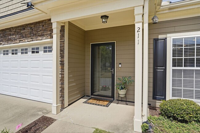 Photo - Experience refined, low-maintenance living in this beautifully appointed end-unit townhome