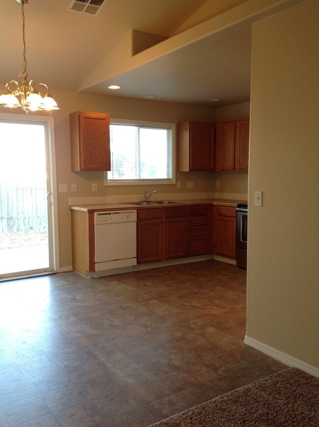 Photo - Fabulous location. Nice home with new carpet and paint. Living and family room.