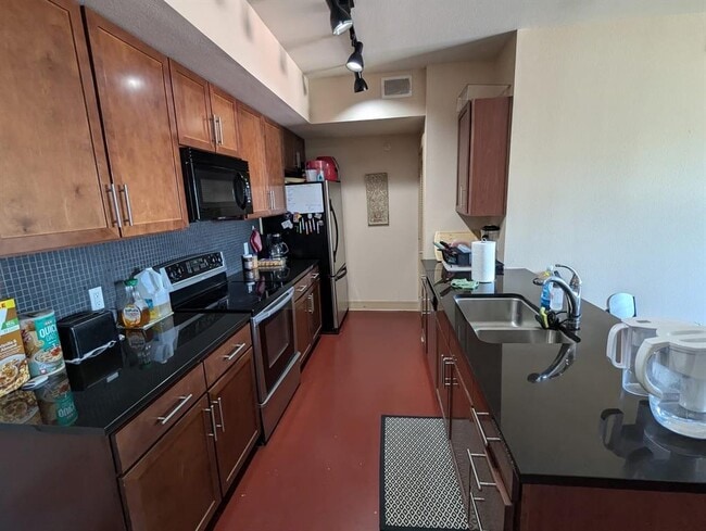 Building Photo - 3016 Guadalupe St Unit 205