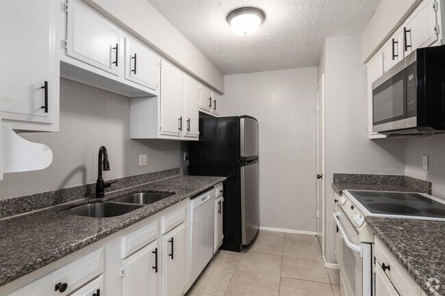 Building Photo - 10555 Turtlewood Ct Unit 412 Rental