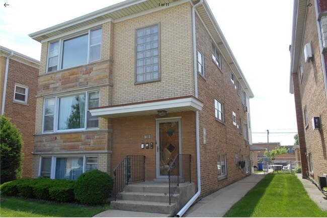 Building Photo - 6825 W Leland Ave Unit 3