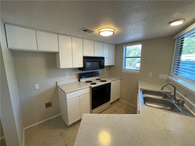 Building Photo - 2500 Burleson Rd Unit 206