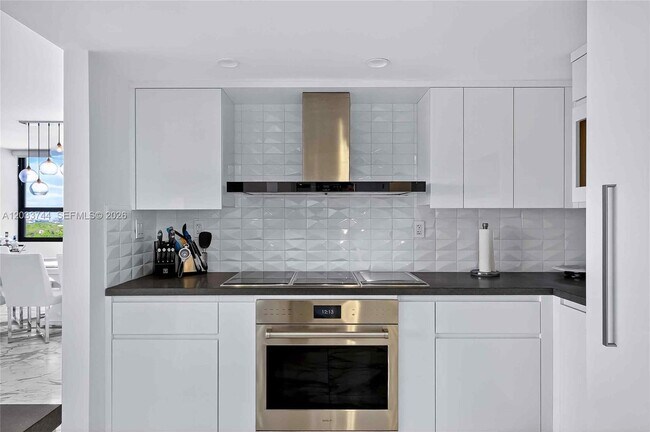 Photo - 2 Grove Isle Dr Unit B1210