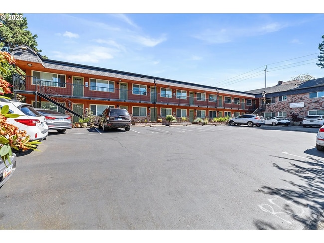 Building Photo - NE ~ Charming 2 Bedroom 1 Bathroom Condo! Reserved Parking, Storage , Some Utilities Included! ...