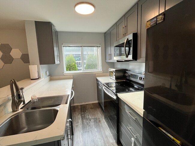 Photo - 12530 109th Ct NE Unit F204