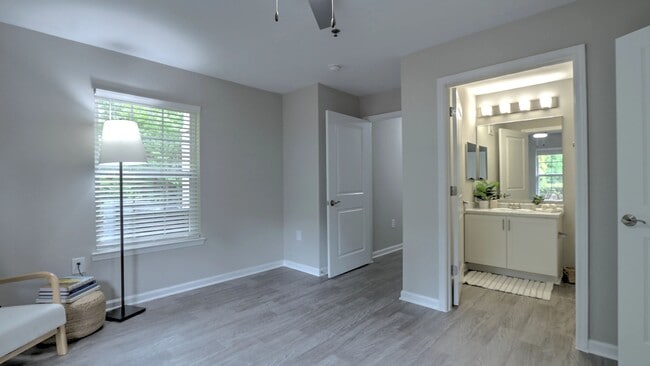 Luxe primary suite with adjoining bathroom for your own private haven.