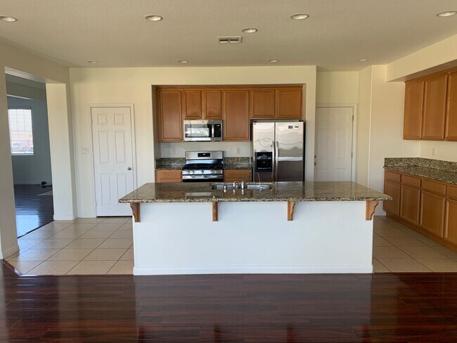 Photo - 4 Bedroom Home with Paid Solar, 3-Car Garage & Large Backyard