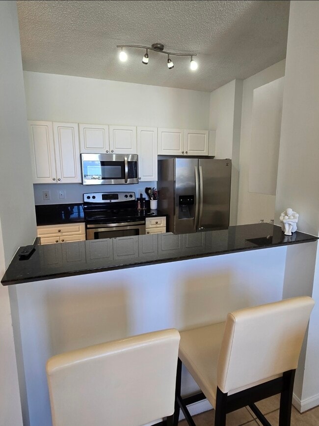 Building Photo - 651 Okeechobee Blvd Unit Penthouse110611thFloor
