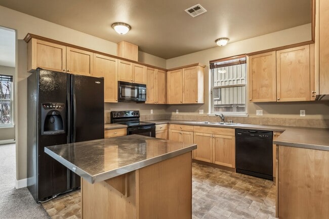 Photo - Spacious 4-Bedroom Home with New Paint & Carpet, Fenced Yard