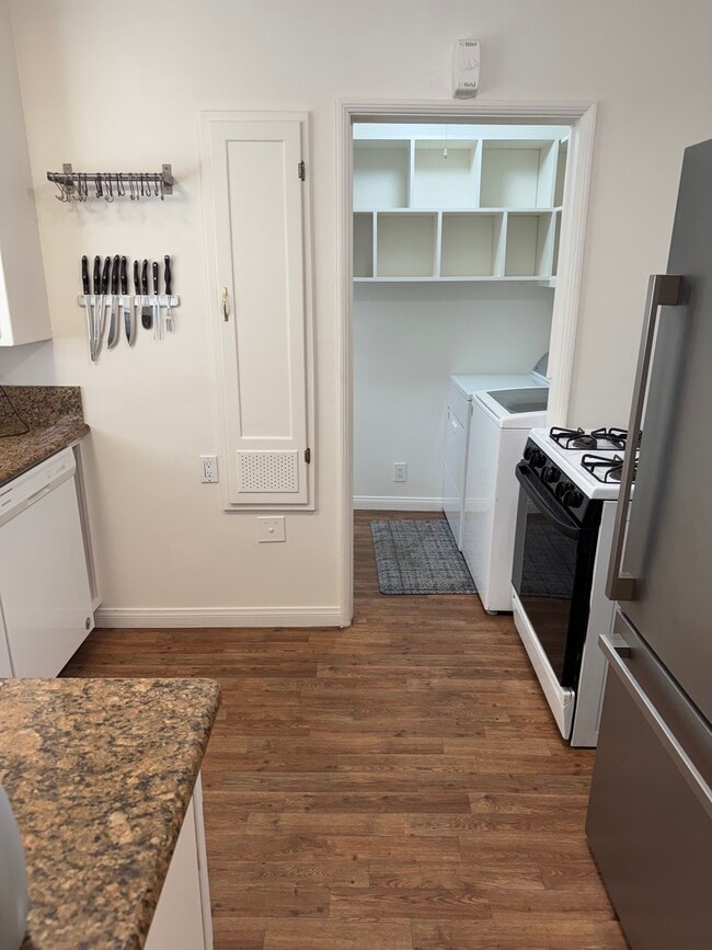 Kitchen and private laundry room - 5981 Guthrie Ave Unit #1