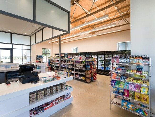 A neighborhood market at nearby Walsh Village offers everyday essentials and quick grab-and-go options close to home.