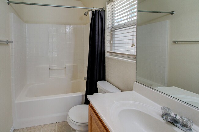 Photo - **$800 OFF MOVE IN BY 12/12/25**3-Story Home with Private Bathrooms and Strip View