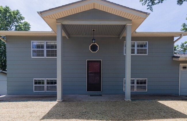 Building Photo - Charming 3BR Home-Screened Porch, Private Garage & Massive Backyard