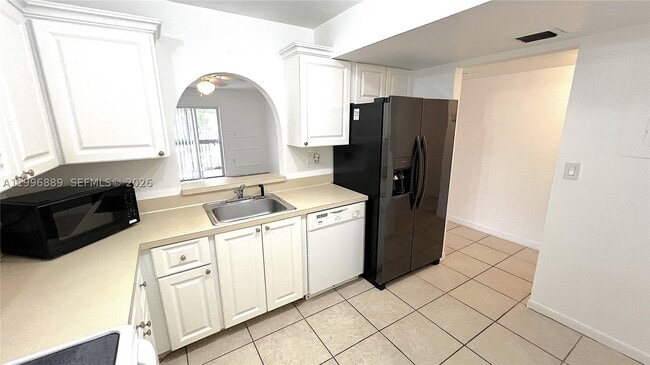 Photo - 711 N Pine Island Rd Unit 211