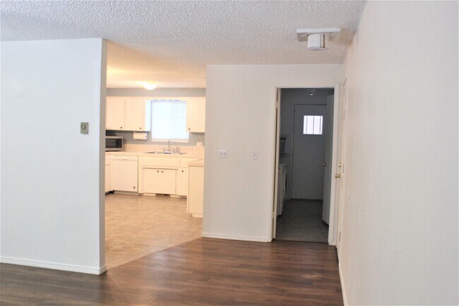 Entry/Living Room into Kitchen - 1206 E Best Ave Unidad 1206