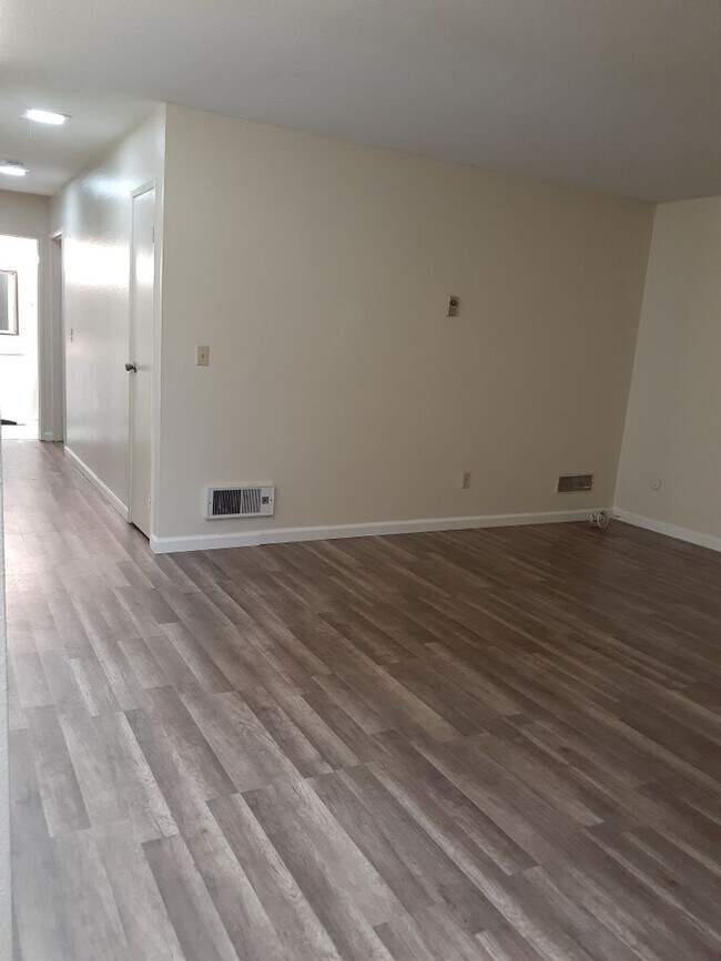 Photo - 3 bedroom, 2 bath, ground floor unit, and private patio. Unit 4