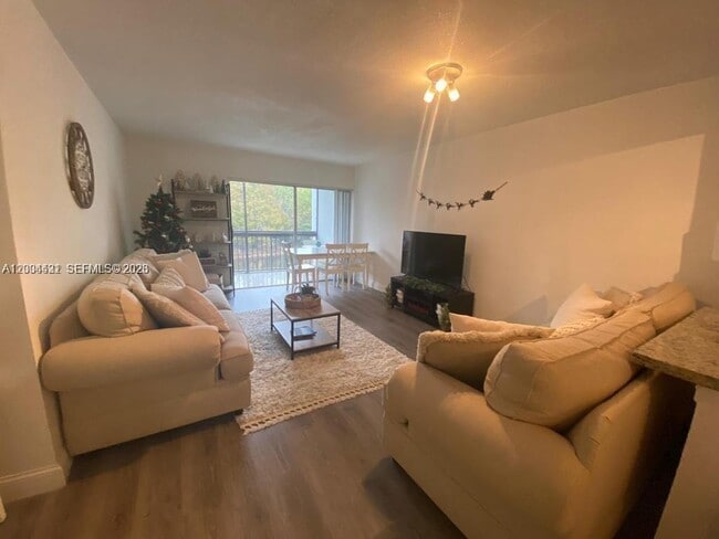 Photo - 721 N Pine Island Rd Unit 209