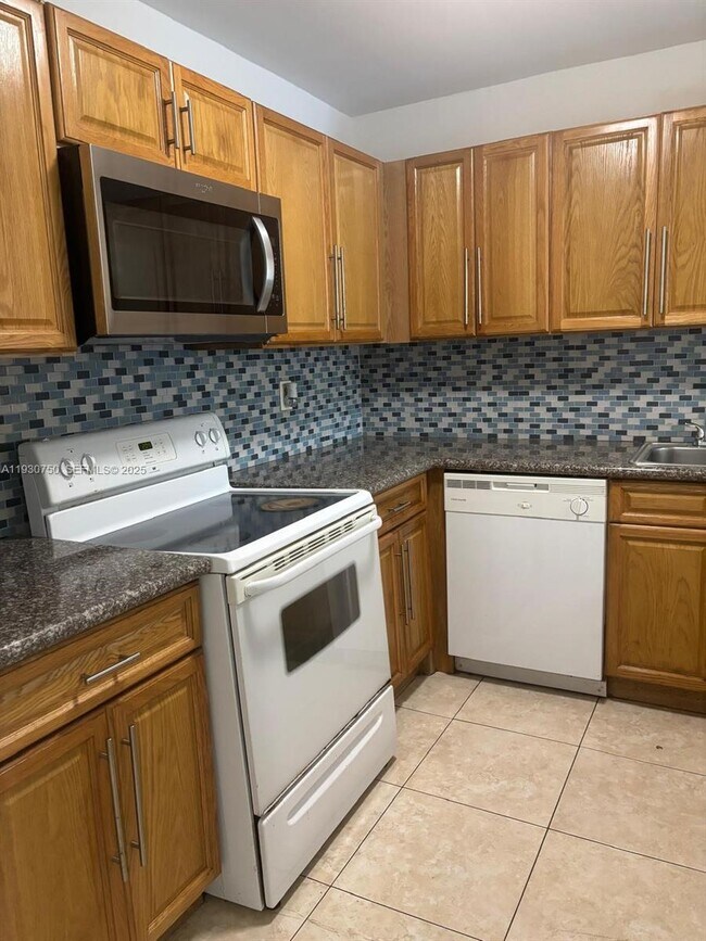 Photo - 6930 Miami Gardens Dr Unit 1-411