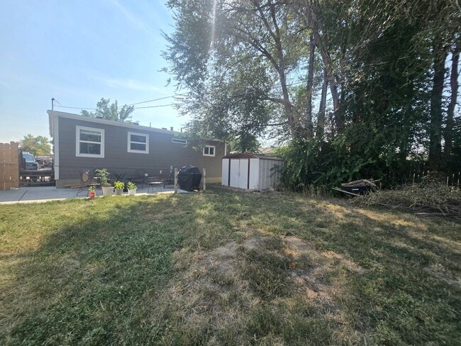 Photo - Spacious 4 Bedroom Home with Fenced Yard + Pet Friendly! NOT FURNISHED