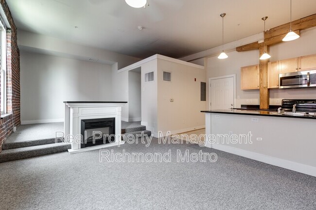 1321 1/2 E. Main St. - 1321 1/2 E. Main St. Condo Unit 303