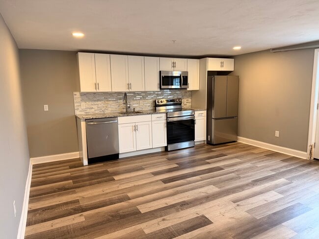 Kitchen angle 1. - 396 Main St Unit 2