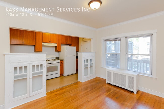 Building Photo - 5104 W 18th St Unit 5104-2M
