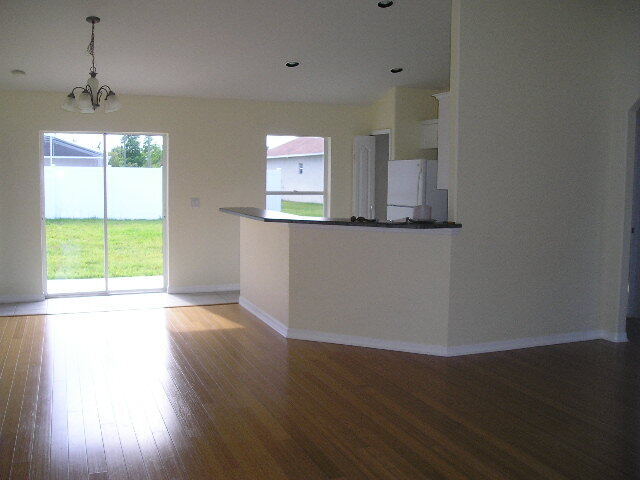 Building Photo - "Charming 3-Bedroom Haven with 2 Baths in Palm Coast – 1208 Sq Ft of Cozy Living!"