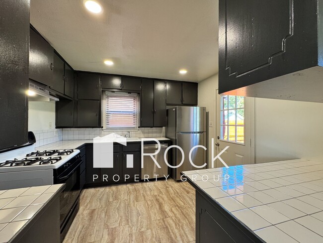 Photo - Charming Home with Real Wood Floors and Covered Parking ~ Offering 1 Month FREE Rent~