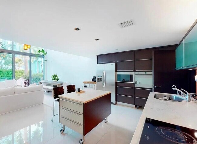 Photo - 6000 Collins Ave Condo Unit 124