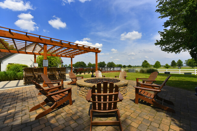 Fire Pit & Grilling Area - Fairways at Hartland Apartments