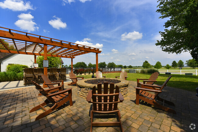 Fire Pit & Grilling Area - Fairways at Hartland Rental