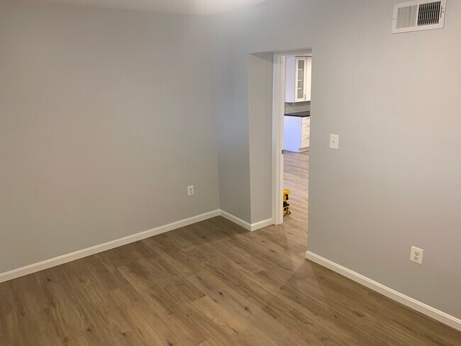 Bedroom #1 with kitchen in the background. - 4631 Massachusetts Ave NW Unidad Basement