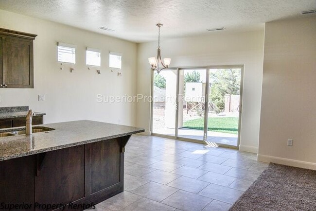 Photo - 4 bed, 2.5 bath home, 2 car garage with a large yard/ Pet friendly