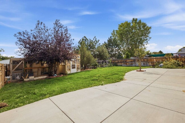 Photo - Spacious 5-Bed Retreat with Modern Updates in Aurora. Included - Greenhouse and Shed!