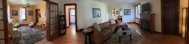 Spacious living room with wood burning fireplace - 340 Woodlawn Pike