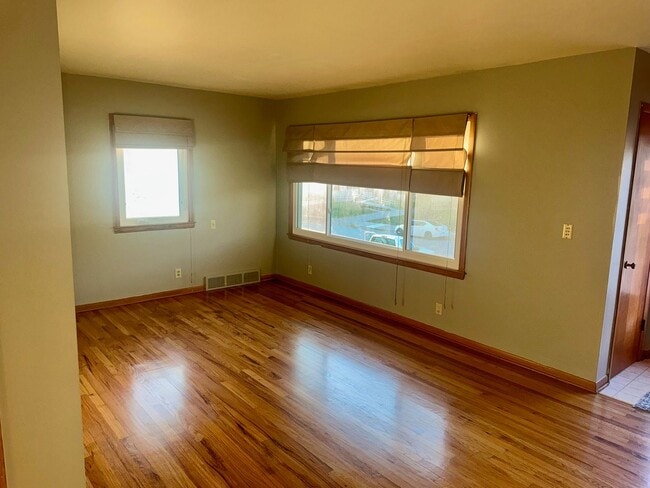 Photo - Bright and Spacious 3-Bedroom Home with Flexible Living Space