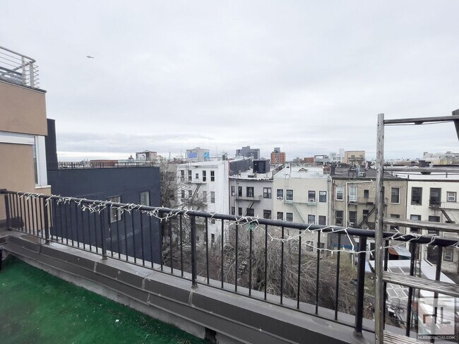 Photo - 3BR 1BA Skylit w/ Private Rooftop Terrace Unit 4B