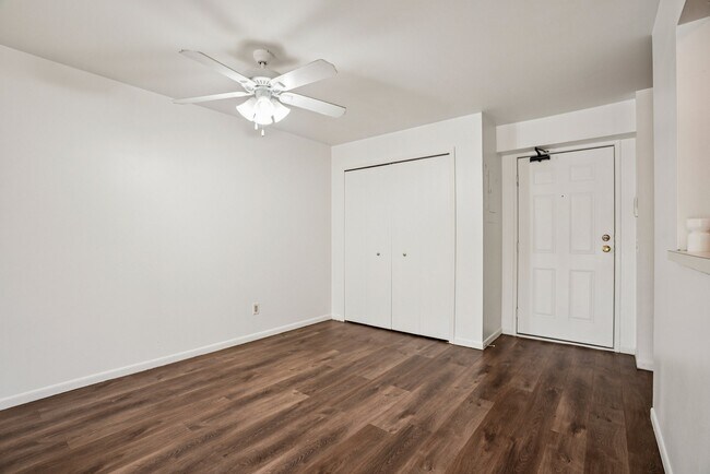 Welcoming entryways feature wood flooring and convenient closet storage for everyday essentials, professionally operated by Highlands Vista Group.