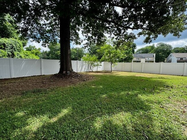 Fenced yard by Greenway near Grissom High School