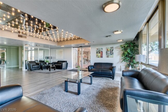 Building Photo - 205 E Harmon Ave Unit 1003