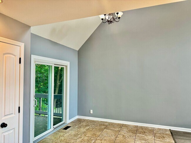 Photo - Large Open 4 Bedroom Home with Bonus! Tree Lined Backyard with Privacy Fence!