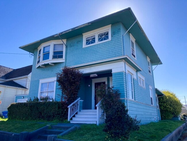 Photo - This pet-friendly colonial-style home features very large rooms!