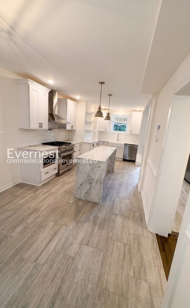 Photo - 4 Bed, 3 Bath Home with Fenced Yard / Pet-Friendly / Available Now!